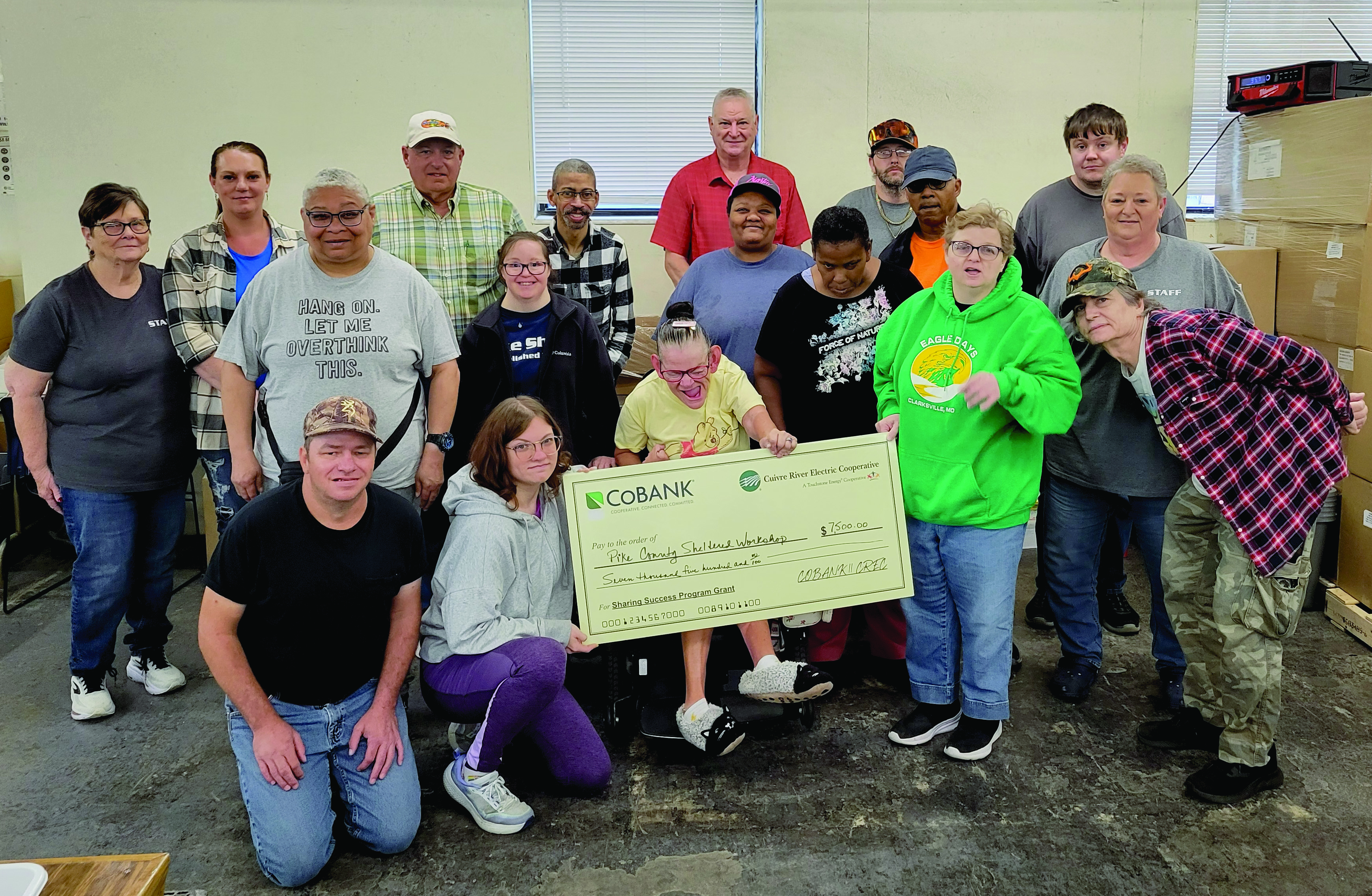 Pike County Sheltered Workshop - From left, front row, Justin McCurdy, Sadie Waller, Val Garig, Lawanda Matthews, Kristina Spears, Clay Walker; second row, Kecha McPike, Angie Adams, Sam Chatman, Roosevelt Phipps, Lisa Lovell, PCSW Director; back row, Marilyn McCrory, Supervisor, Jessica Breth, Melvin Motley, PCSW Board Member, Jermaine Davis, Walt Gregory, CREC Board Director, Kenny McCafferty, Jack Waller.