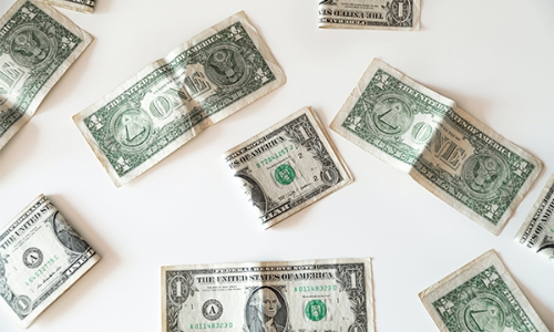 Dollar bills on a table
