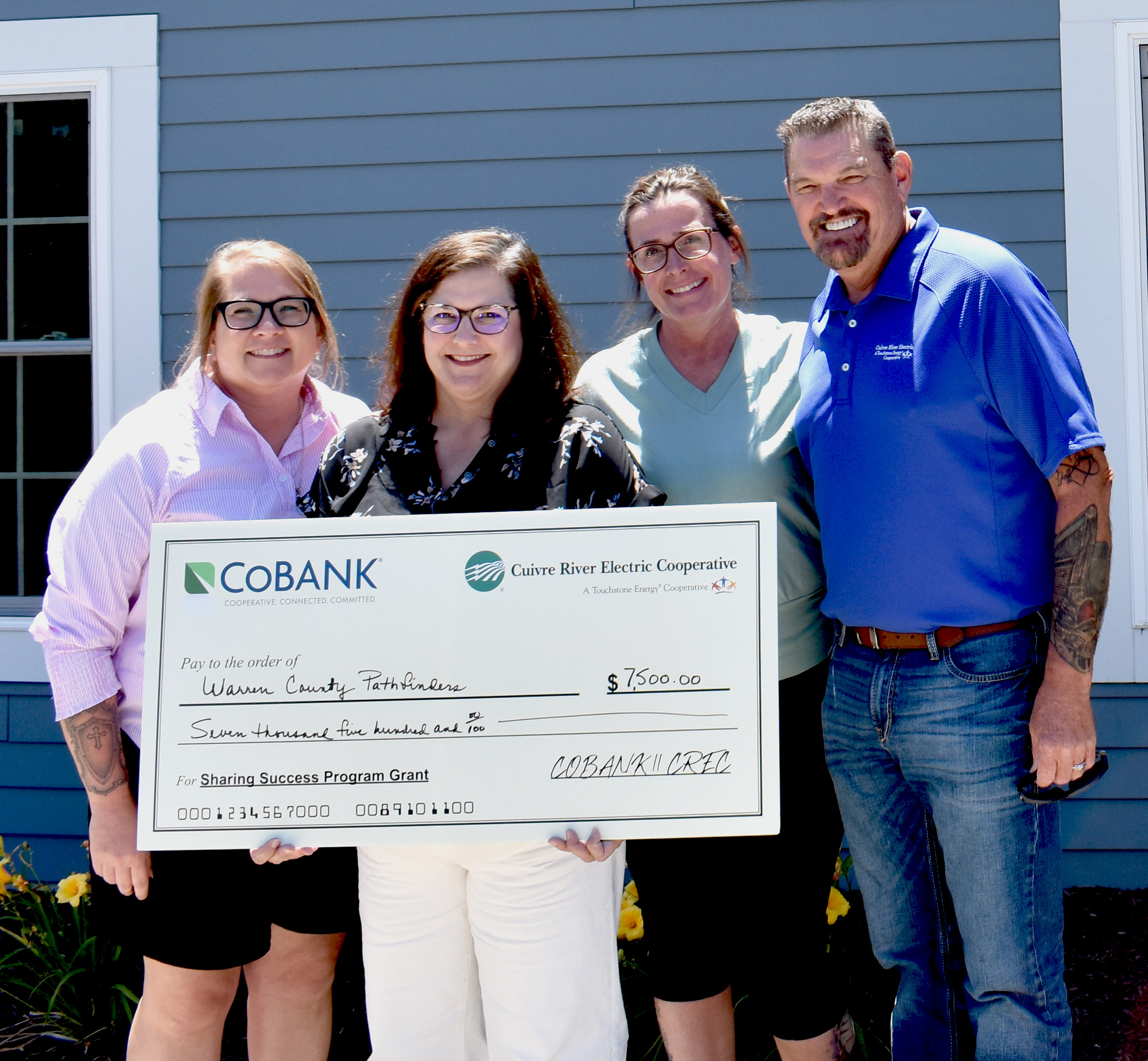 From left, Katie Taylor, WCP Co-Chief Executive Officer; Robin Kuhlmann, WCP Director of Development; Kelli Clodfelter, WCP Co-Chief Executive Officer; Jeff Culbertson, CREC Board Director.